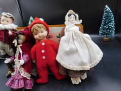 lot 19 xmas porc dolls b